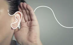 Illustration of a hand cupped to the ear to catch a sound wave